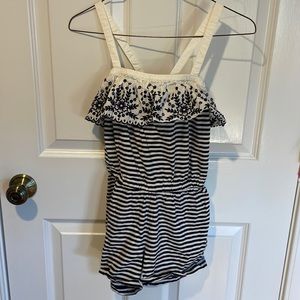 Adorable Hanna Anderson Romper with lace detail.